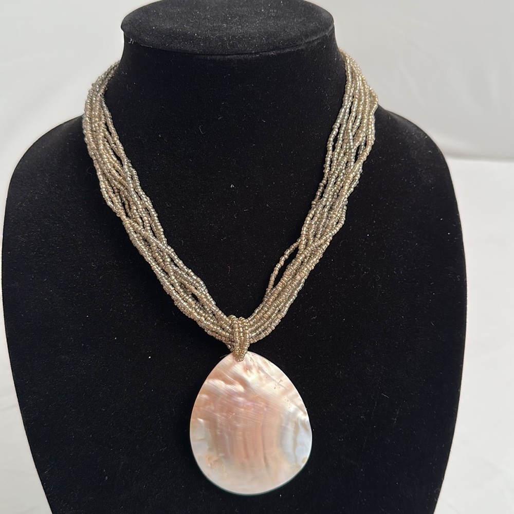 Silvery gray multi-strand beaded shell statement necklace